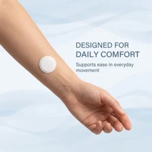 Nuvelliana™ Tremor Control Patch displayed with its thin adhesive-backed wrist design