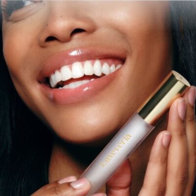 Luxevéria Lip Care Essence Oil in a slim glass bottle